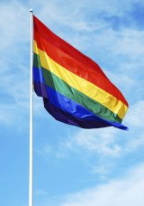 A rainbow flag will fly on Brisbane City Hall.