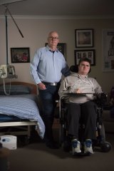 Josh has a degenerative muscular disease which means he needs a carer to attend to his every need. Josh is pictured with his father Rick.
