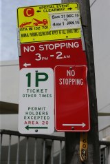 The confusing parking sign which is located on Pyrmont Street, near the corner of Pyrmont Bridge Road. 