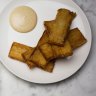 Roasted flathead tail, with a side dish of potato chips served at the Paddington Inn in Sydney.