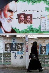 Campaign posters in 1998, when Iran held its first local elections for 20 years.