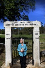 Simple statement: Joan Matthews at the Chewton war memorial.