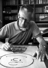 Cartoonist Charles Schulz draws a picture of his cartoon character Charlie Brown in his Sebastopol, Californian home in 1966.