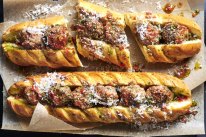 Meatball subs with chimichurri.