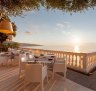 The islands of Ischia and Procida are visible from the terrace.
