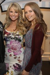 The mother-of-three says pregnancies and menopause caused her hair to thin. Pictured here with daughter Sailor Lee Brinkley Cook.