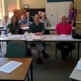 Angie Ellis, in green top, with members of the U3A investment group who meet in Benalla, Victoria.