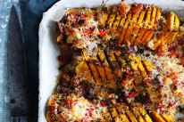 Butternut pumpkin wedges with cous cous and parmesan crust.