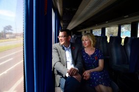 Campaign trail: Opposition Leader Daniel Andrews and wife Cath on the campaign bus.