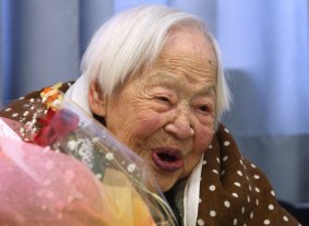 Misao Okawa, who is recognised by Guinness World Records as the world's oldest woman, reacts during her 115th birthday celebrations at Kurenai Nursing Home on March 5, 2013 in Osaka, Japan. Misao Okawa, was born in Tenma, Osaka, on March 5, 1898.