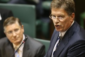 Former Victorian premier Ted Baillieu giving his last speach in the house as Denis Napthine looks on.   