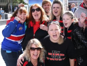 Supporters of James Hird congregate outside the Federal Court building on Monday