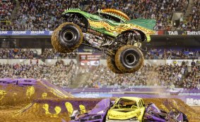 View outlandishly decorated giant trucks as they perform gravity-defying stunts in Monster Jam. 