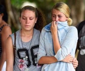 A community in pain after eight children were killed in a Cairns home.