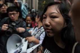 Former Indonesian domestic helper Erwiana Sulistyaningsih, 24, arrives at the District Court before the sentencing of her former employer Law Wan-tung, in Hong Kong on Friday. 