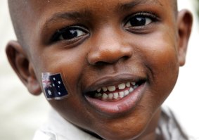 Ali Kamara, 2, was born in Australia to Liberian parents who have become citizens of their adopted homeland.