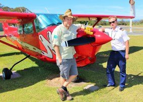 Tim the Yowie Man joins pilot Kyle Mills preflight at Merimbula airport, south coast.