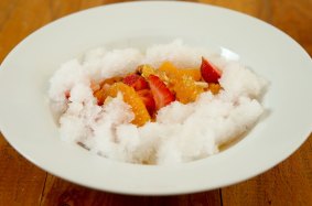 Summer on a plate: Strawberries and oranges with gin-and-tonic granita.
