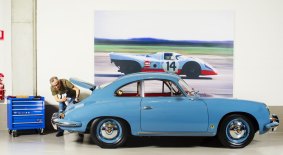 Perfectly preserved: Borghetti in his Sydney warehouse with one of his classic cars, a 1962 Porsche 356B. 