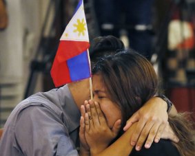 Filipinos react as the tribunal ruled against China.
