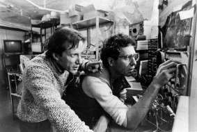 Max (James Woods), left, and Harlan (Peter Dvorsky) discovering the transmission signal of Videodrome. 