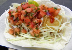A fish taco from Tacofino is packed with fresh ingredients.