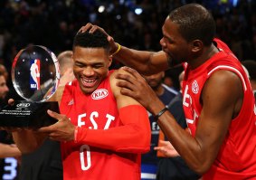 Trophy: All Star game MVP Russell Westbrook with Oklahoma City Thunder teammate Kevin Durant.
