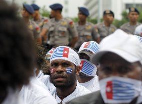 West Papuans activists watched by Indonesian police in Jakarta.