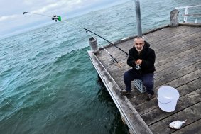 On the spot: Sam Psanis fishing on the Albert Park jetty.