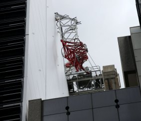 The jib of a crane at a work site in North Sydney collapsed on Sunday, leaving three people in hospital. 