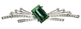 A green tourmaline and diamond brooch by H. Stern sold for $2200 at Leonard Joel auction in Sydney on March 7. 