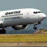 A Boeing Co. 737-800 aircraft operated by Qantas Airways Ltd. takes off from Sydney Airport in Sydney, Australia, on Monday, Feb. 22, 2016. Qantas Airways is scheduled to announce half-year earnings on Feb. 23. Photographer: Brendon Thorne/Bloomberg