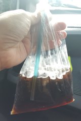 A soft drink served in a plastic bag in Indonesia.