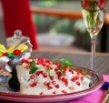 Chiles en nogada, a traditional festive dish, served at Azul's three restaurants in Mexico City, Mexico. The dish consists of poblano peppers, stuffed with fruits and meats, covered in walnut cream sauce and pomegranate seeds. It is eaten in Mexico between August and early September only. 
