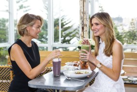 Superfood smoothies were the order of the day for Lara Worthington (left) and Kater Waterhouse.