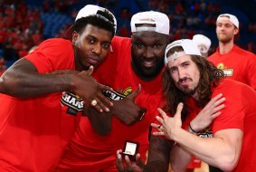 Rings: Casey Prather, Nate Jawai and Greg Hire.