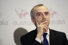 Virgin Australia chief executive John Borghetti  says opening the door to foreign airlines would put significant pressure on existing players. 
