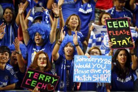 Sea of blue: Chelsea supporters react in Bangkok.