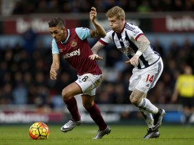 Eyes on the prize: West Ham United's Manuel Lanzani and West Bromwich Albion's James McClean.