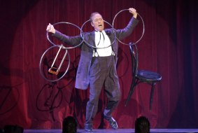 The Eccentric aka Charlie Frye performs with the linking rings as part of The Illusionists: 1903. 
