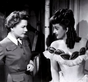 Anne Baxter shines as Eve Harrington and Bette Davis as Margo Channing in All About Eve.