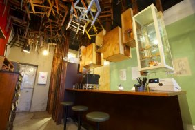 Brother Baba Budan, designed by Breathe, hangs second-hand chairs from the ceiling. 
