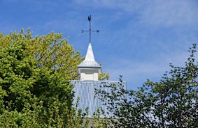 Where in Canberra? last week. Florence Young, of Macarthur, identified  the roof of the old stables building at Government House, Yarralumla.