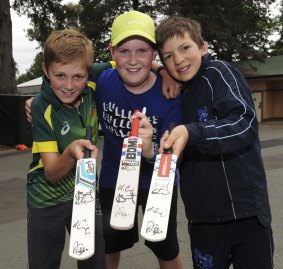 Young fans Fin McCrae, 11, of Holder, Ethan Kirk, 12, of Kambah, and Harry Austin, 11, of Fisher.