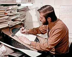 Cam Ford at his animation desk directing a sequence on Marco Polo Junior Versus the Red Dragon in 1971.