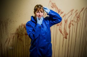 CIT forensic science student Stephanie Oliver  learns about blood splatters at the institute's specialised crime scene facility.