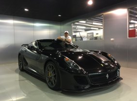 Wheel collector: Melbourne Ferrari enthusiast Tony Defelice with one of his beloved Ferraris (a 599).