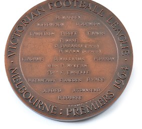 Ron Barassi's 1964 VFL premiership medal.  Estimate: $20,000-$30,000.