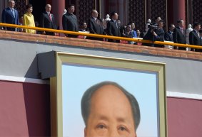 Over the watchful eyes of Mao: Xi Jinping, Park Geun-hye and Vladimir Putin review the troops.