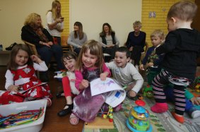 Parents and grandparents attend playgroup at St John's Anglican Church Hall.